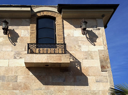 kronos limestone cladding on the outside walls of an Italian style villa